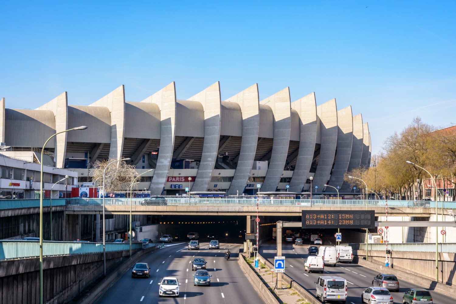 Southeast side of the Parc des Princes stadium in Paris, France, built partially above the ring road.